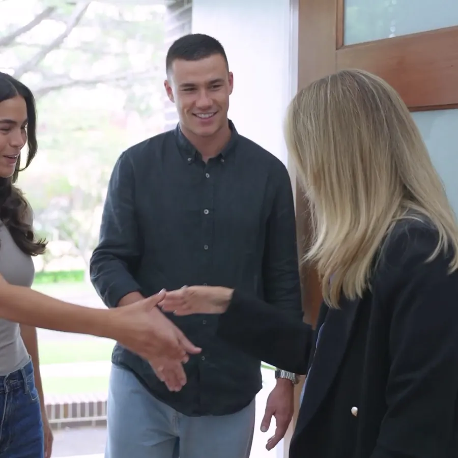 Sellers shaking hands with their agent